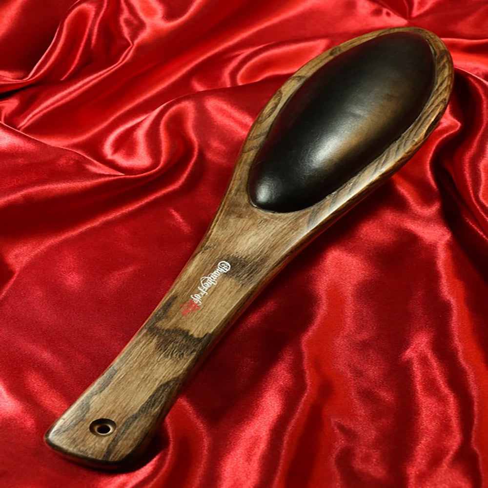 BDSM Teakpaddel mit gepolsterter Seite