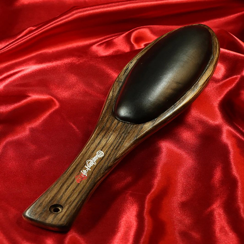 BDSM Teakpaddel mit gepolsterter Seite