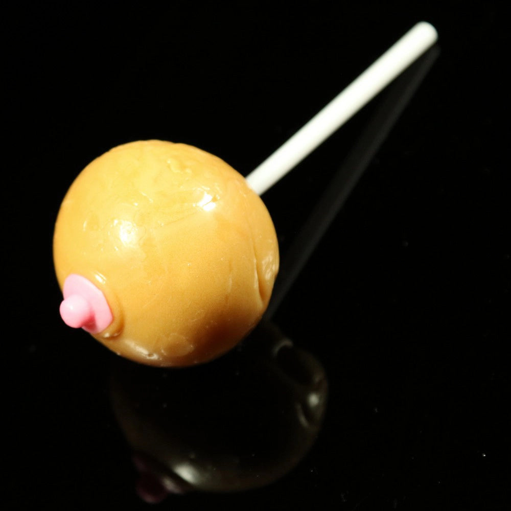 Bröstformad godis klubba