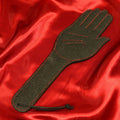 BDSM-Lederpaddel Handen, schwarz mit roten Nähten von Chambers of Love
