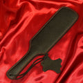 BDSM läderpaddel RACKET svart med röd söm från Chambers of Love